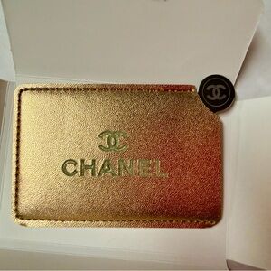 Chanel Beaute Iridescent Gold Mirror Cardholder comes NEW in box. Mirror SEALED